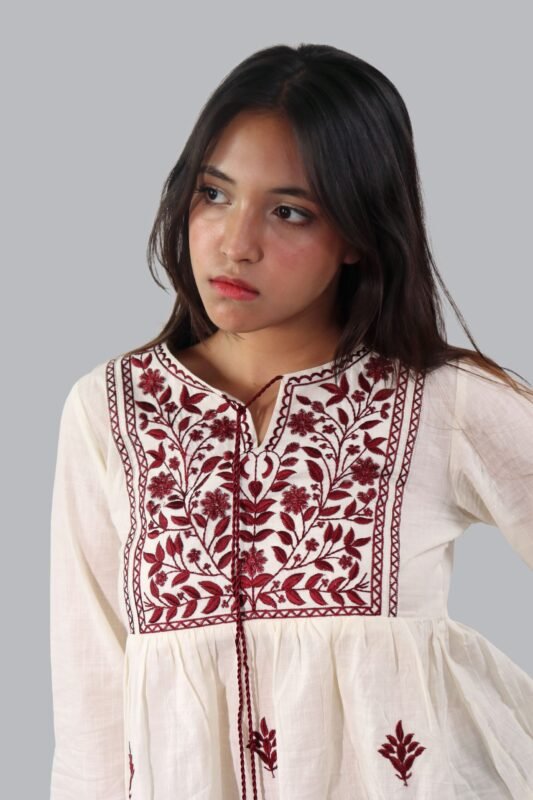 Embroidered top with detailed yoke embroidery